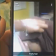 Video showing a student covering her face as someone removes her hijab (WSMV-TV screenshot)